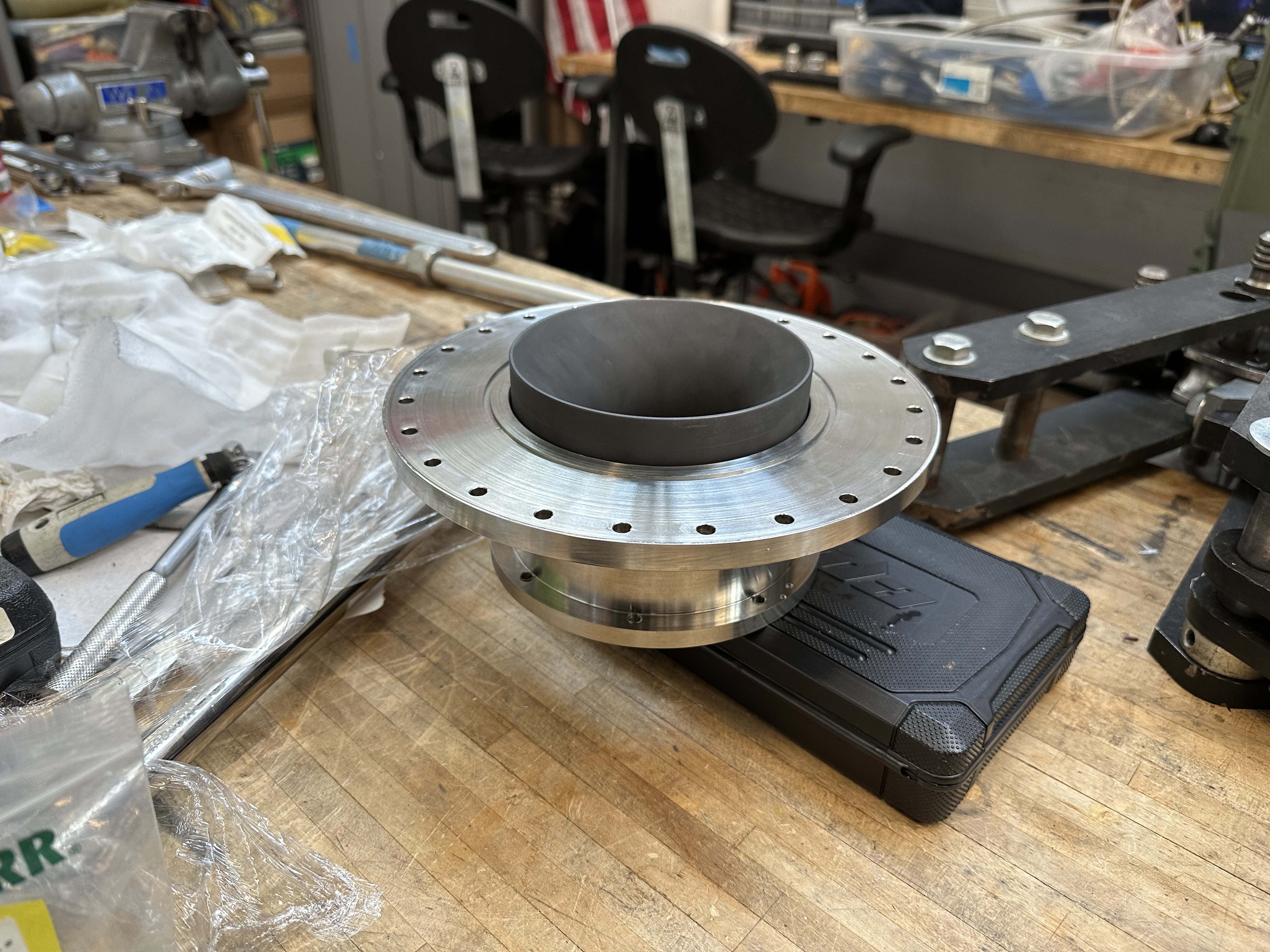 Nozzle flange following post-weld machining